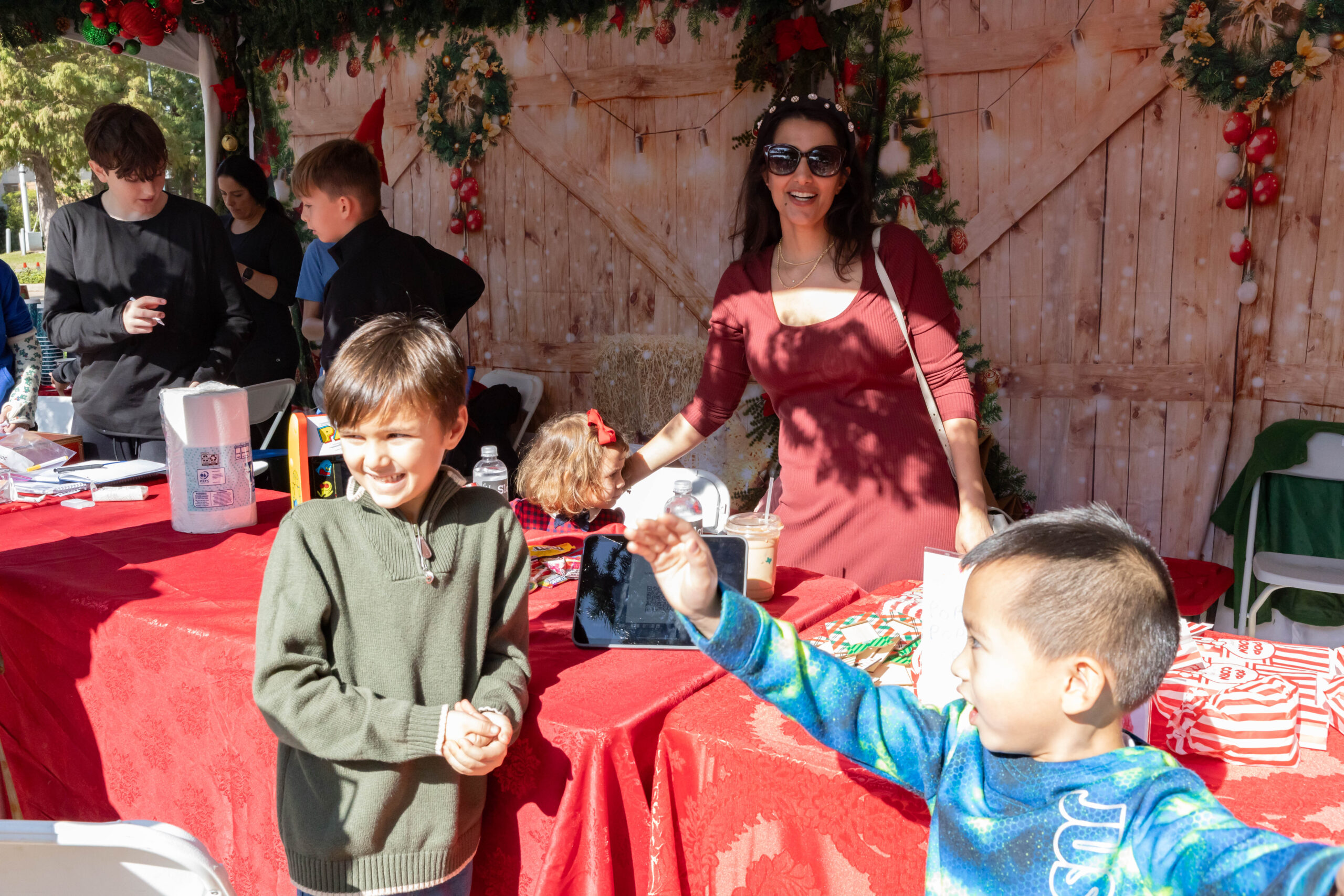Kids inviting customers to their booth